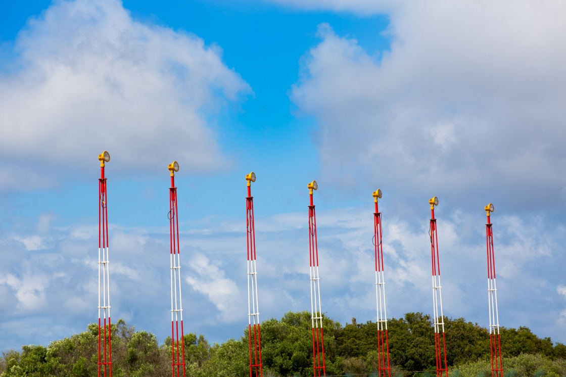 'Airport lights for aircraft landing on blue sky' - Menorca